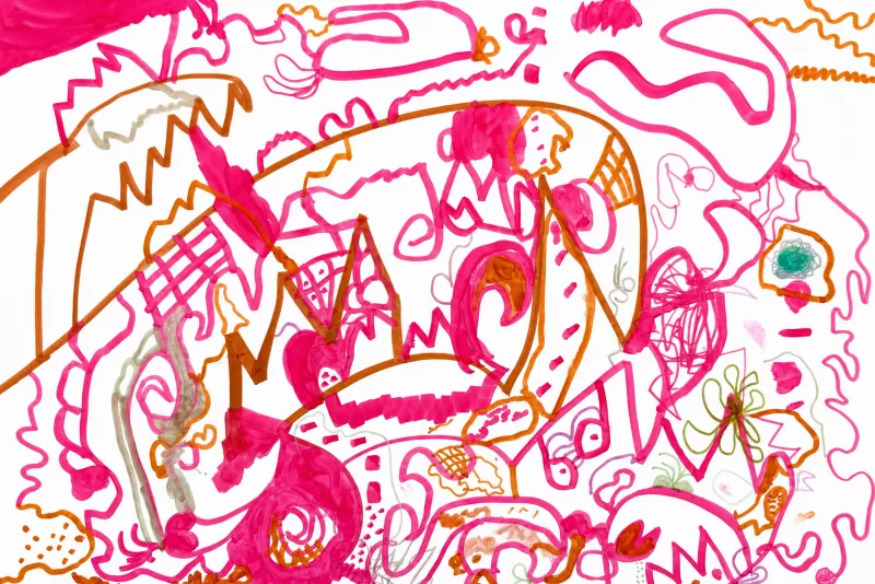 An energetic tangle of pink and orange marker zigzags, loops and patterns.