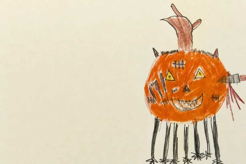 A coloured-pencil drawing of an orange jack-o’-lantern creature with spindly black legs, on cream paper.